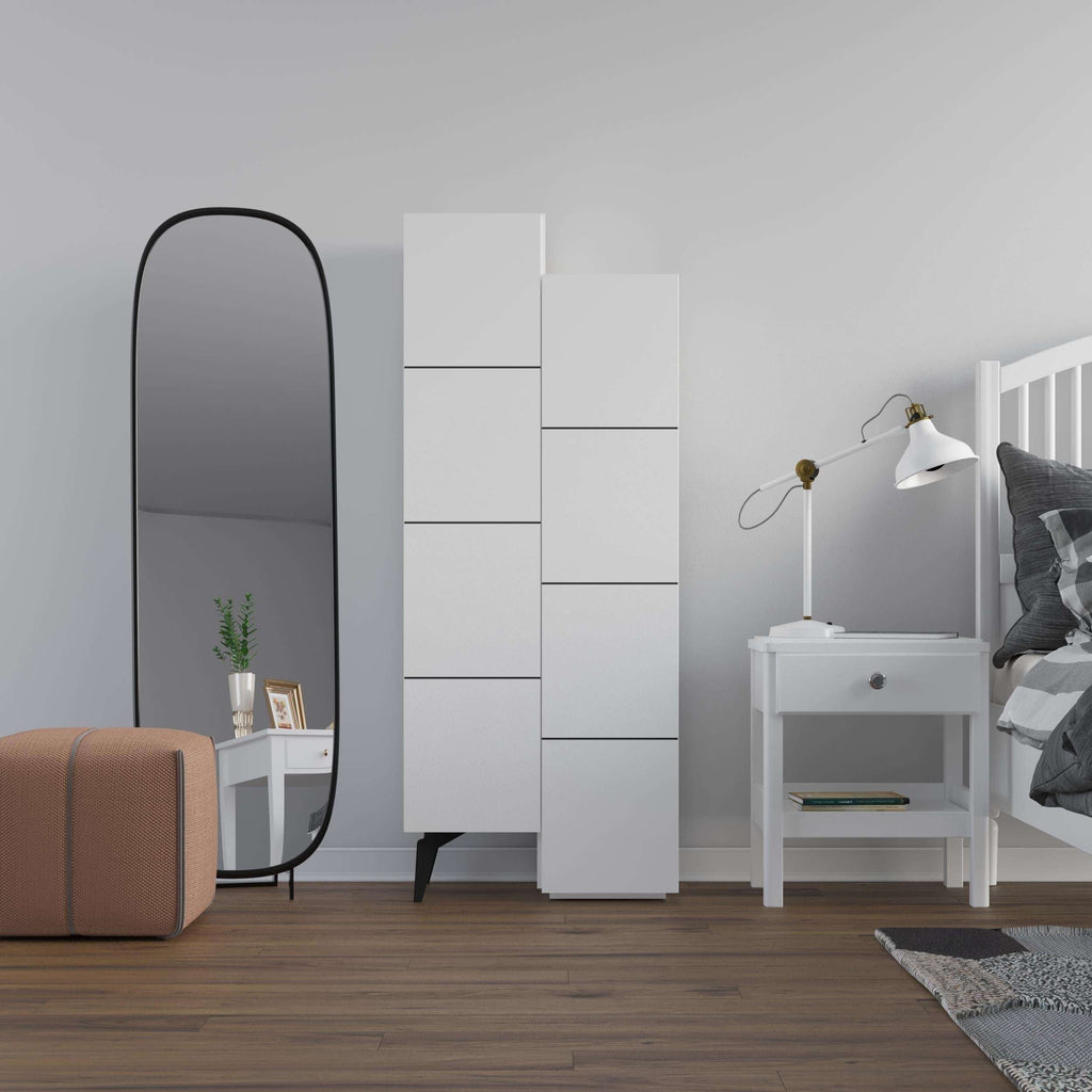 White storage cabinet with open shelves beside a vanity area
