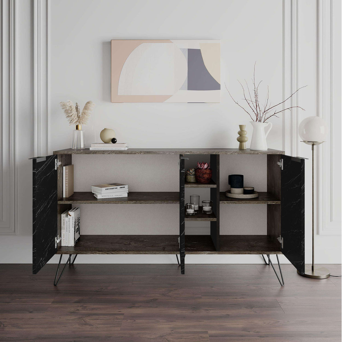 Console sideboard with black marble panels, open shelves, and decorative items on top