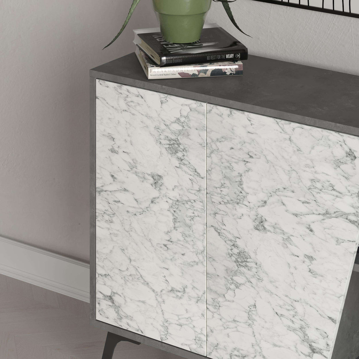 Marble-effect cabinet doors on gray console sideboard, two-door front with central gap