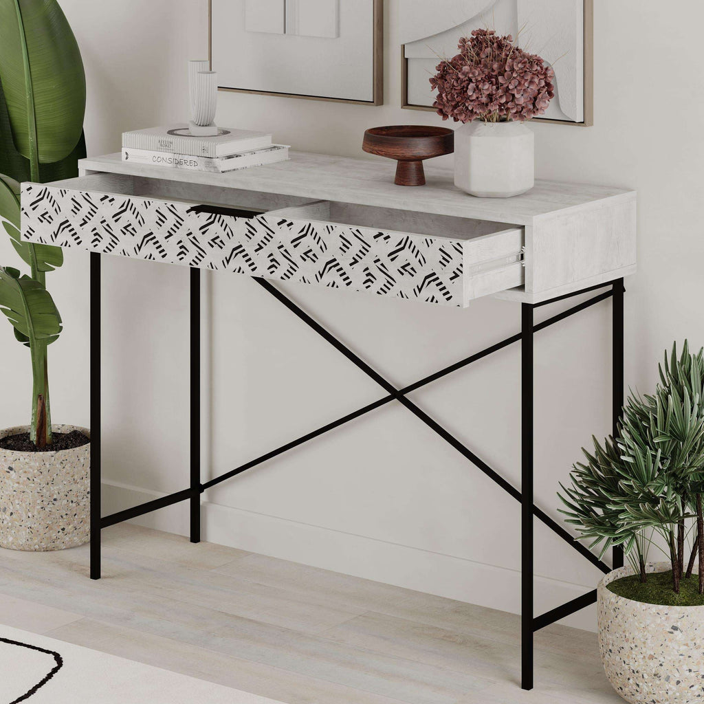 Ancient white console table with patterned drawer and black metal X-frame