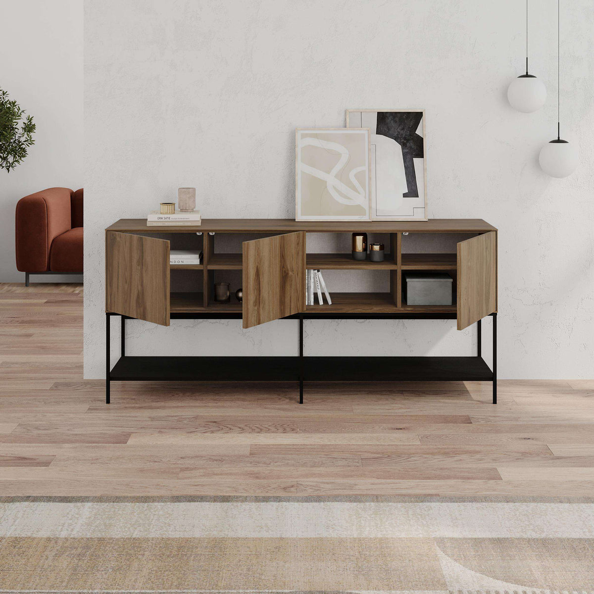 Modern console table with warm wood top, black metal frame, and open storage compartments
