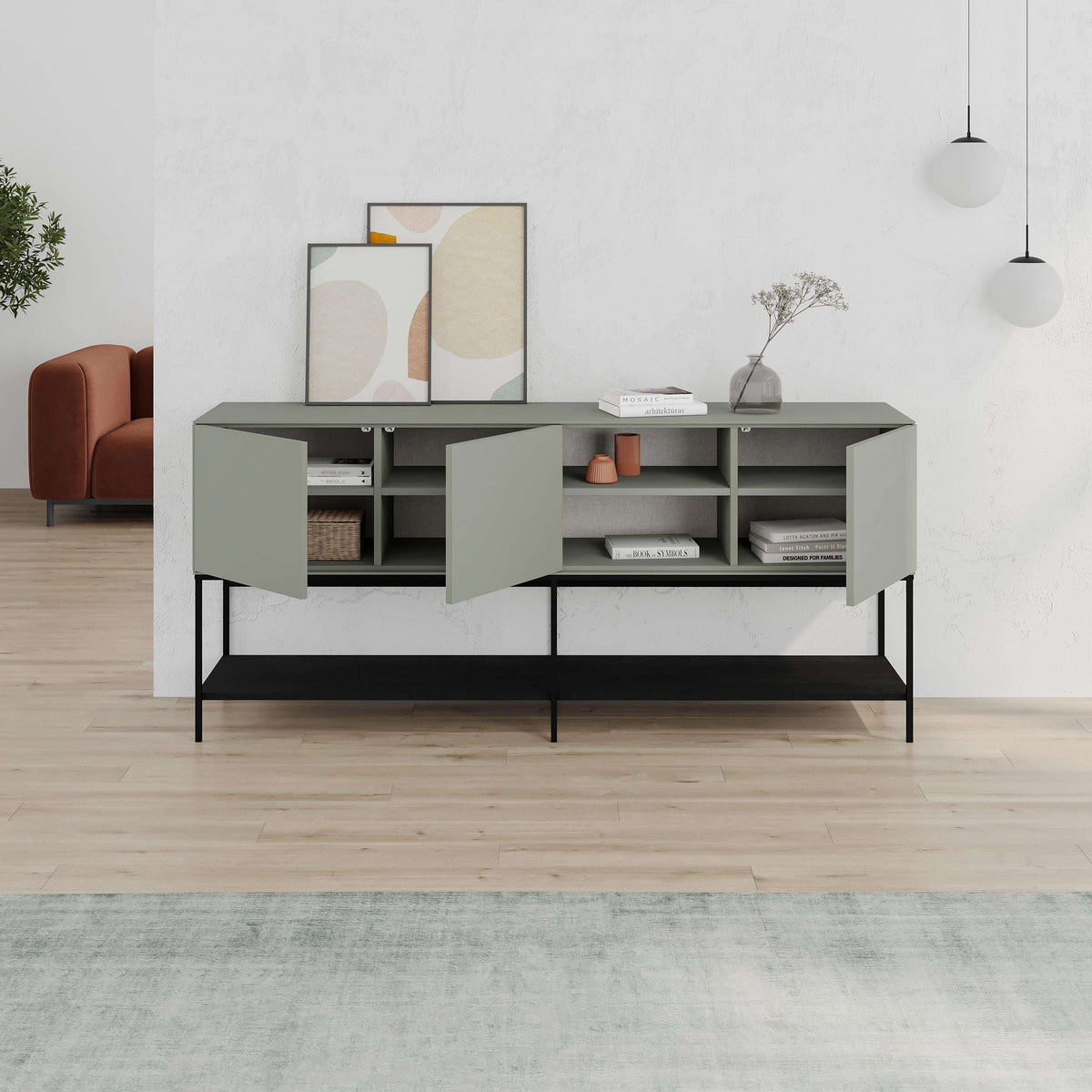 Light gray console table with cabinet doors and open shelving on black legs