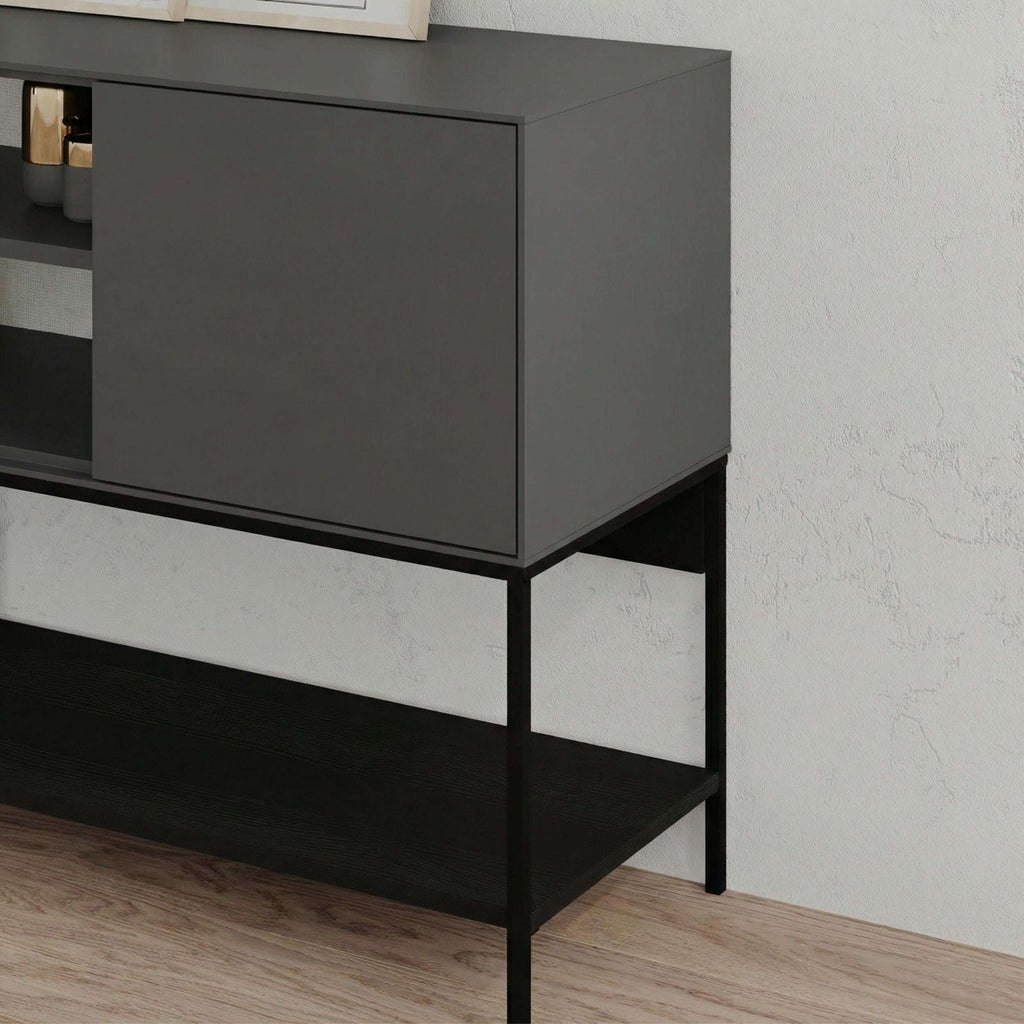 Dark cabinet side panel with open shelf section on black metal legs