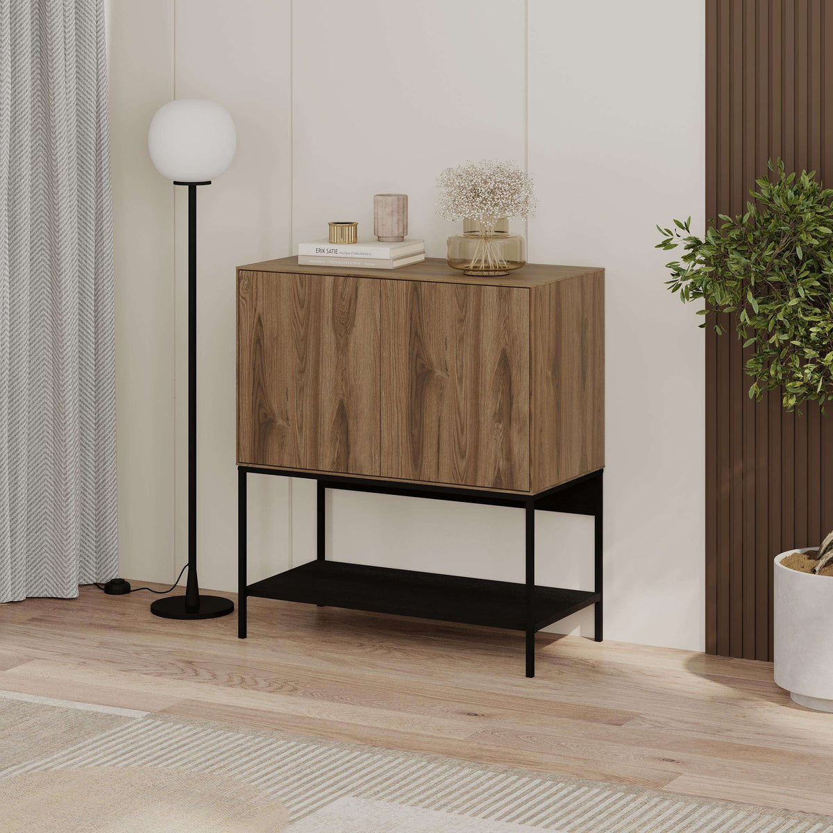 Wood console table with two cabinet doors and black base with open storage shelf