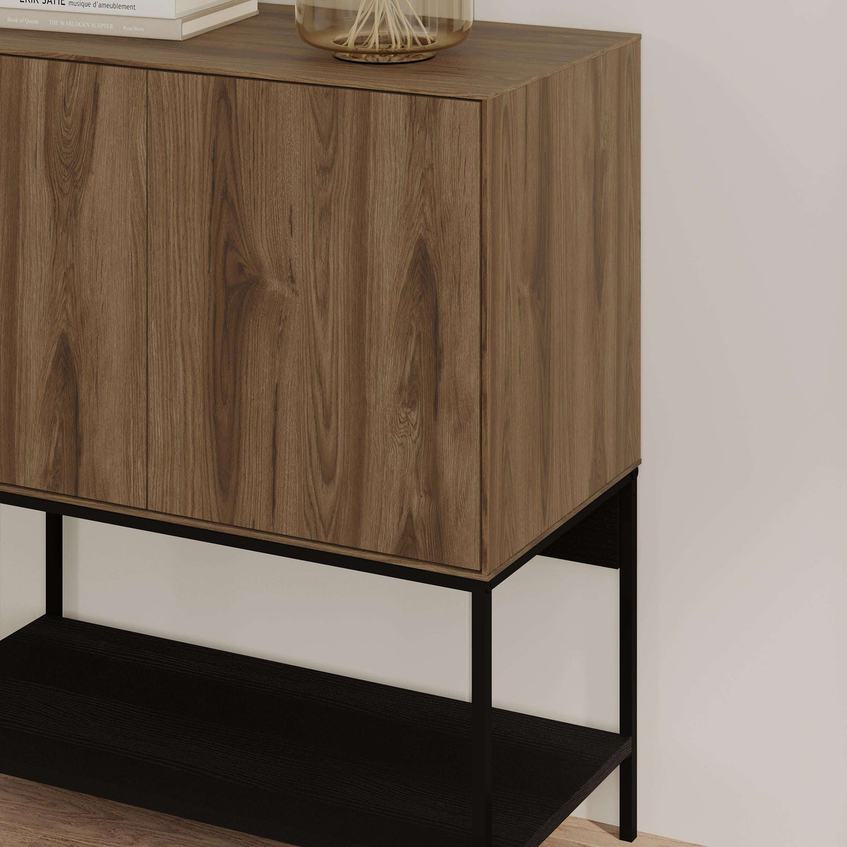 Wood console table corner detail with black metal frame and open lower shelf