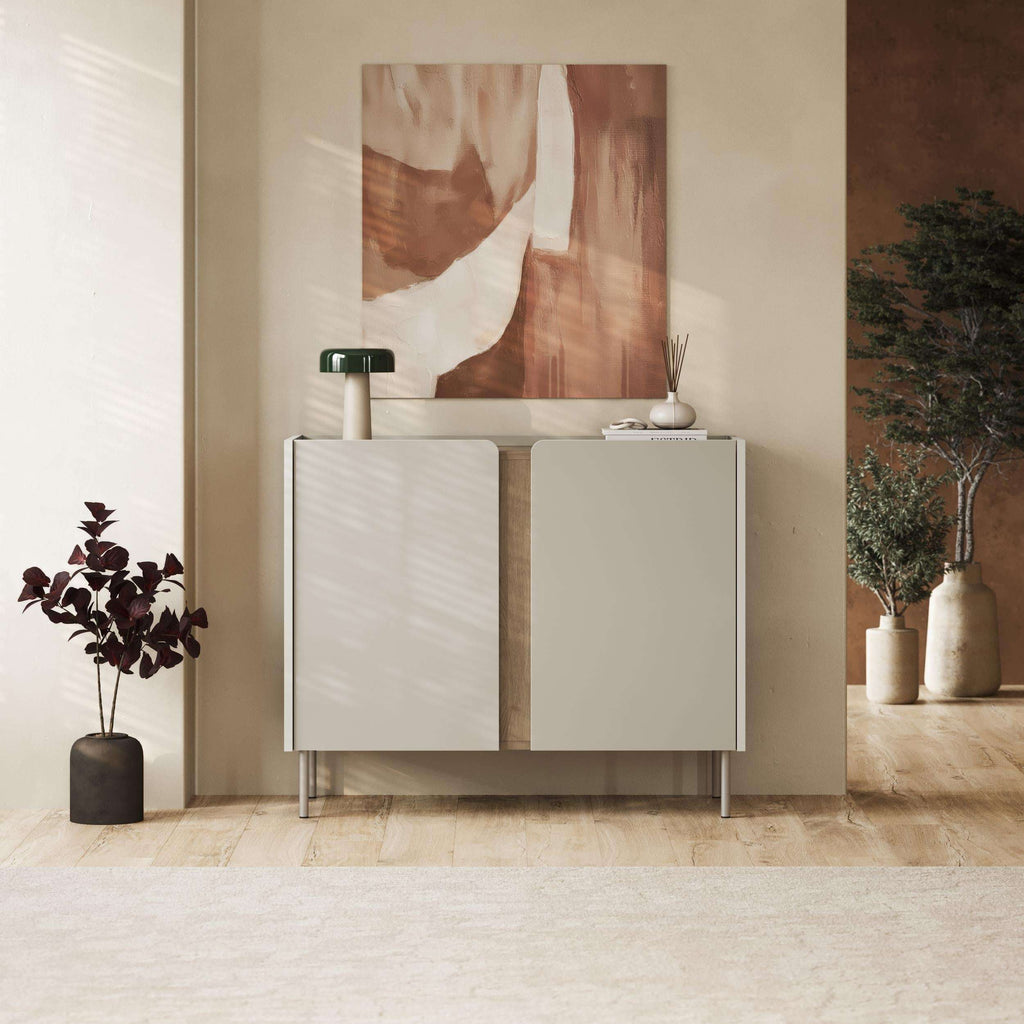 Two-door sideboard with white panel doors, open center shelf, and metal legs