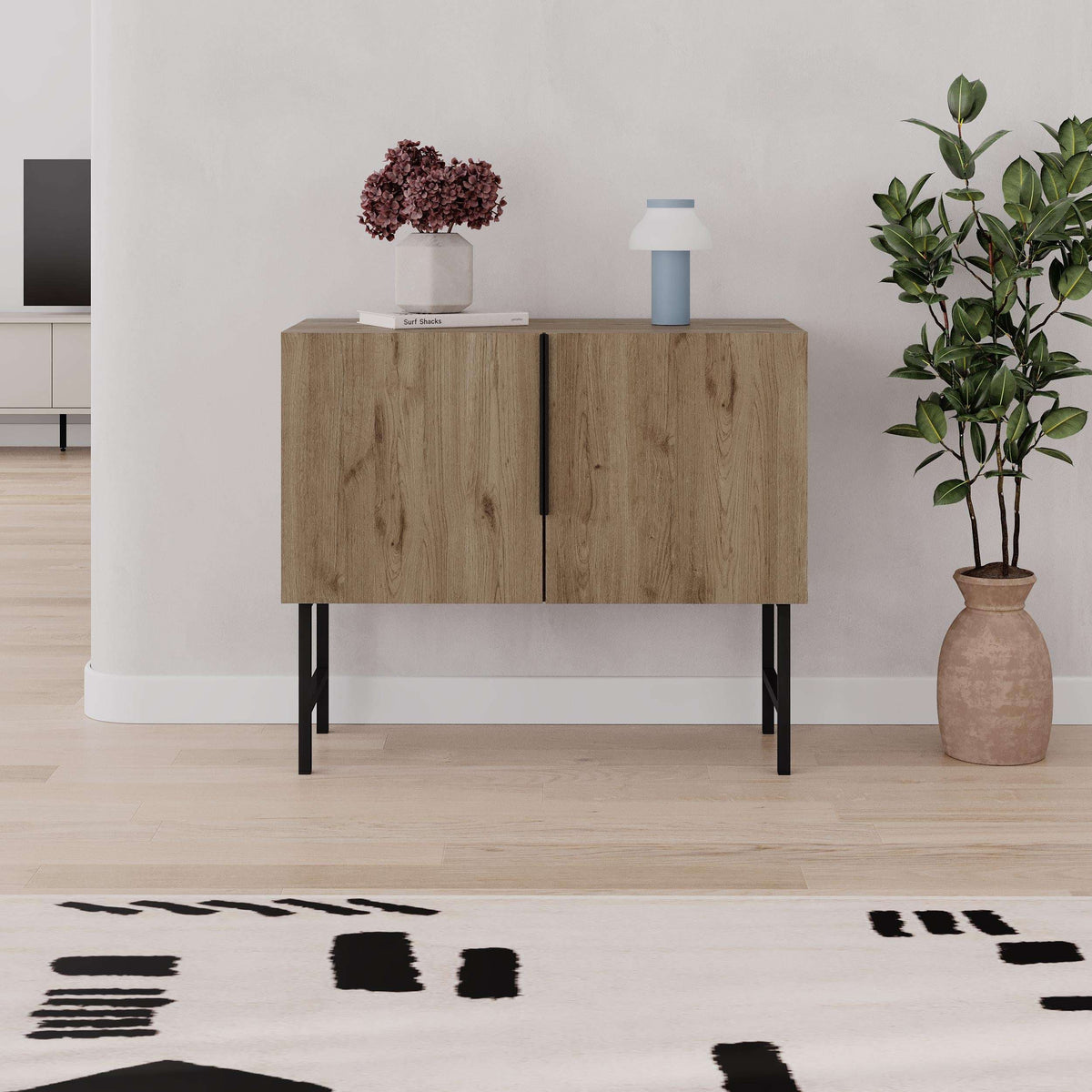Natural oak 2-door console cabinet front view with black legs and center handle.