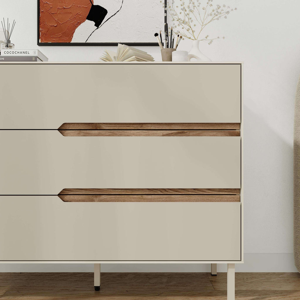 Front close-up of modern chest of drawers with two visible drawers and wood bar handles