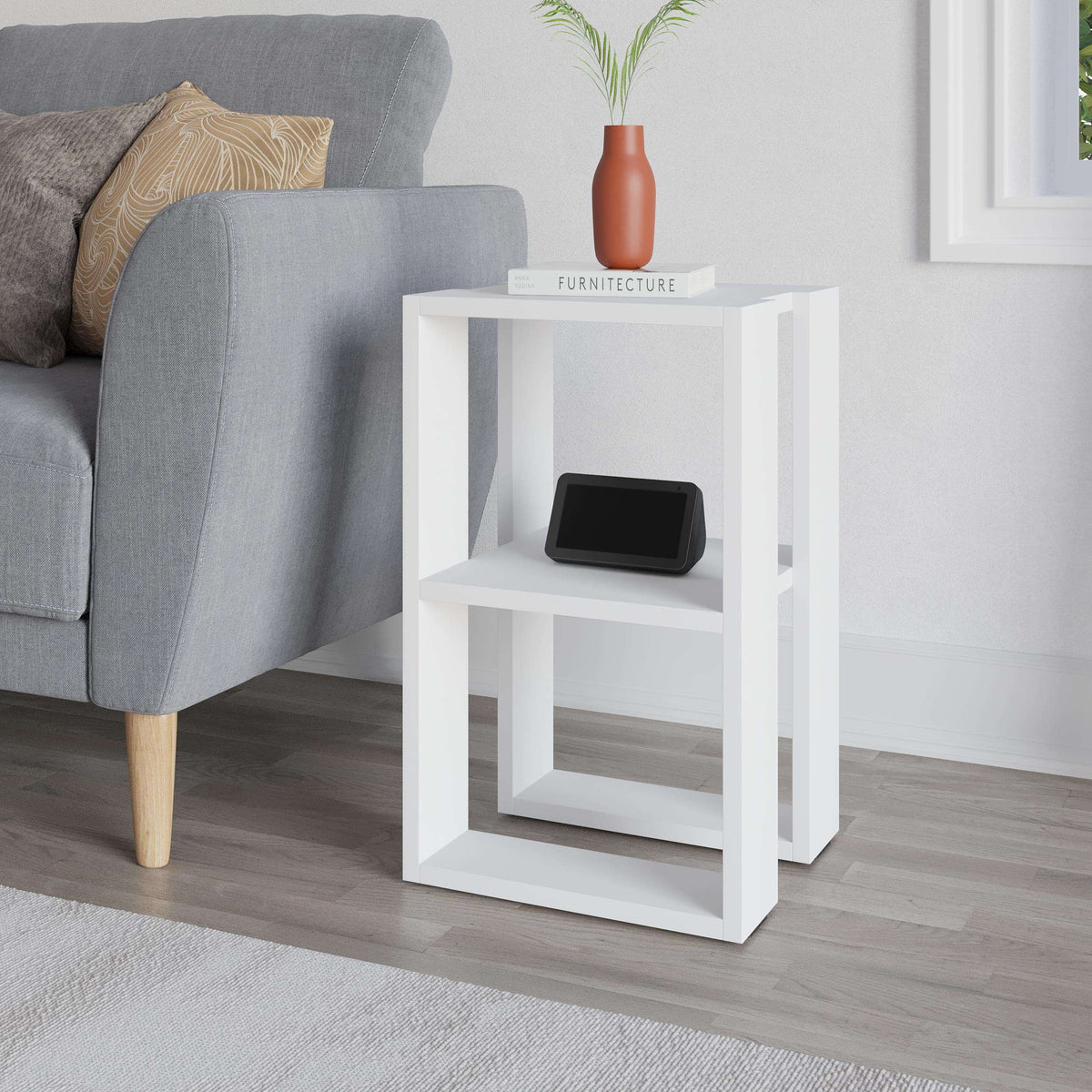 White modern bedside table with open cubby shelves