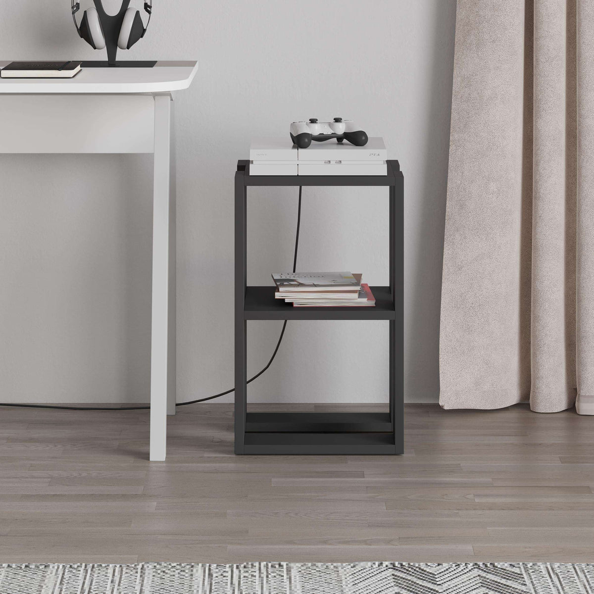 Black bedside table with two open shelves and a flat top for essentials