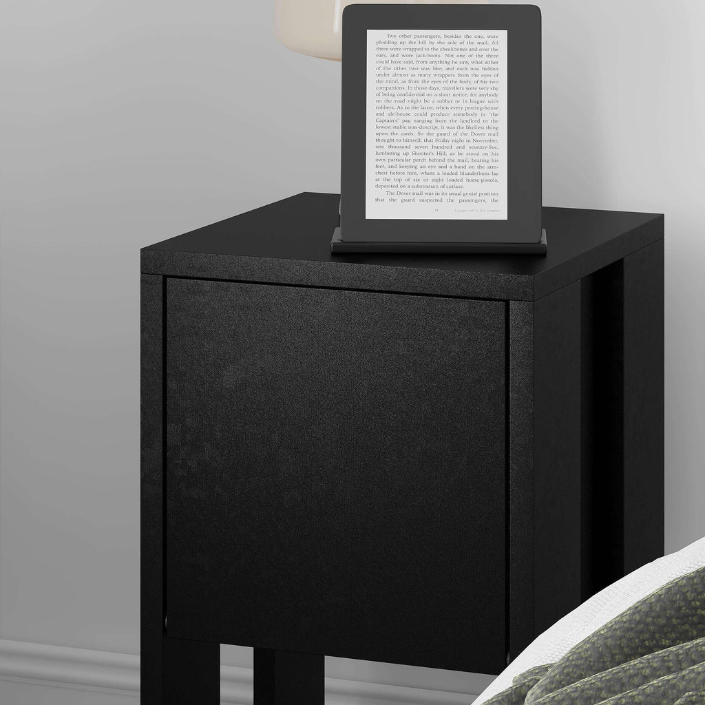 Dark black bedside table with front cabinet door and top tablet stand.