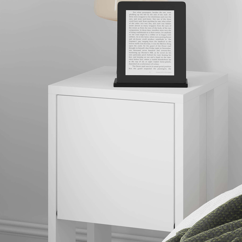 White bedside table with single door and open lower shelf