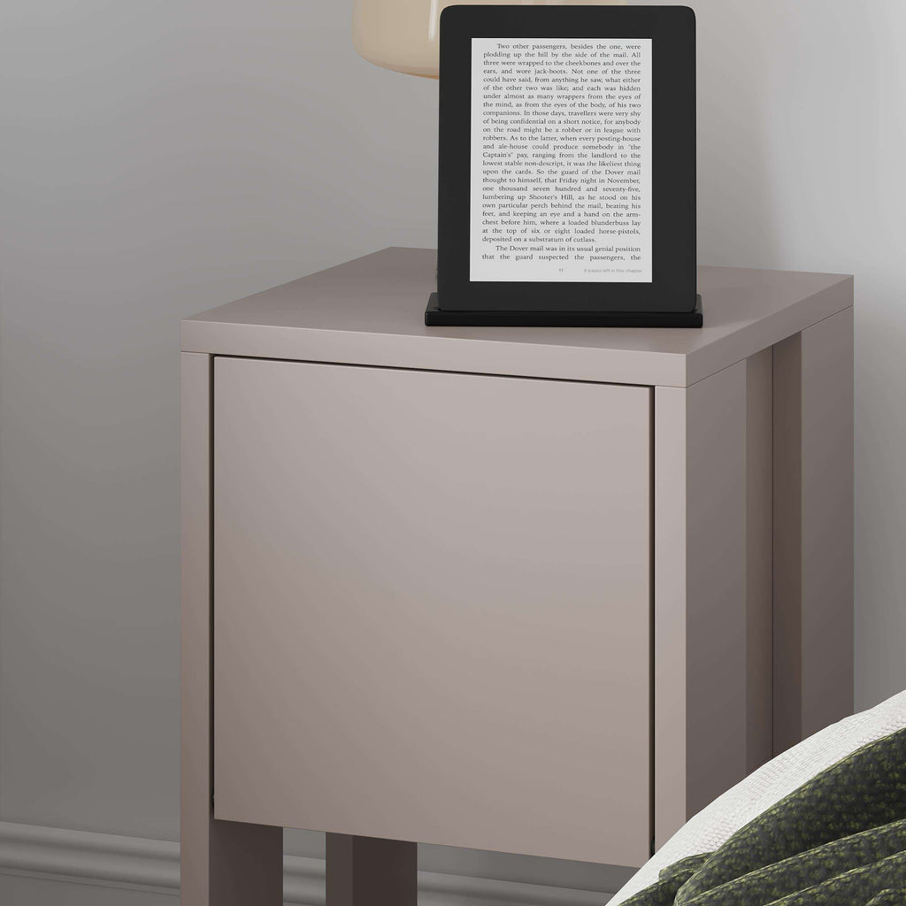 Light mocha bedside table close-up with cabinet drawer and open shelf