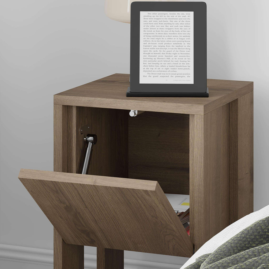 Woodgrain bedside table with hinged cabinet door and lower open shelf, tablet on top.