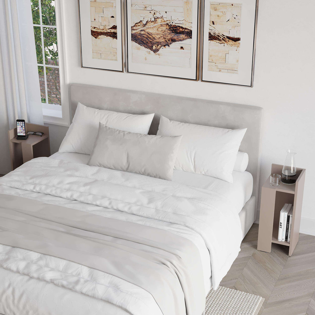 Narrow light gray bedside table with open shelf beside bed, book and phone