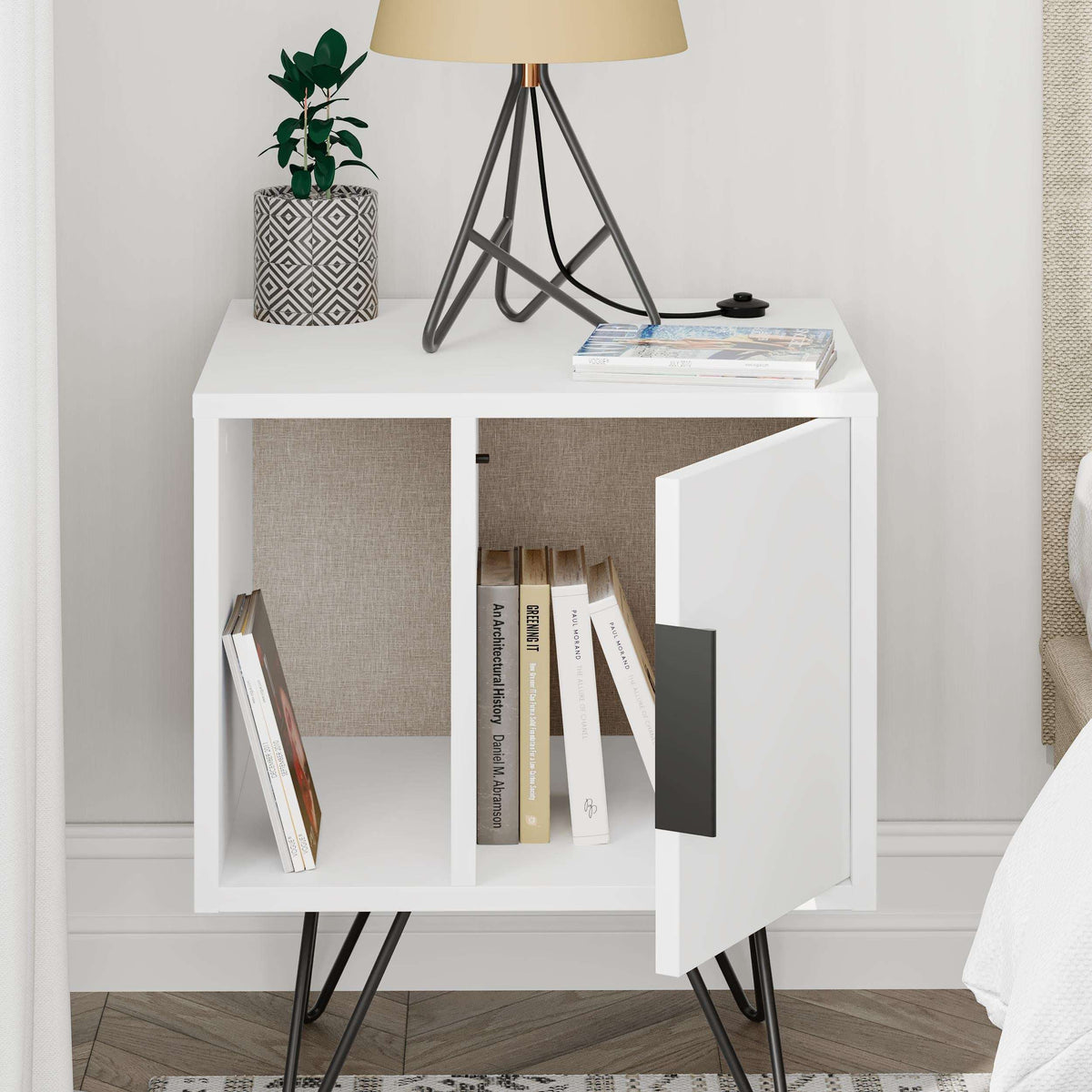 White modern bedside table with open shelves, cabinet door, black legs and pull handle