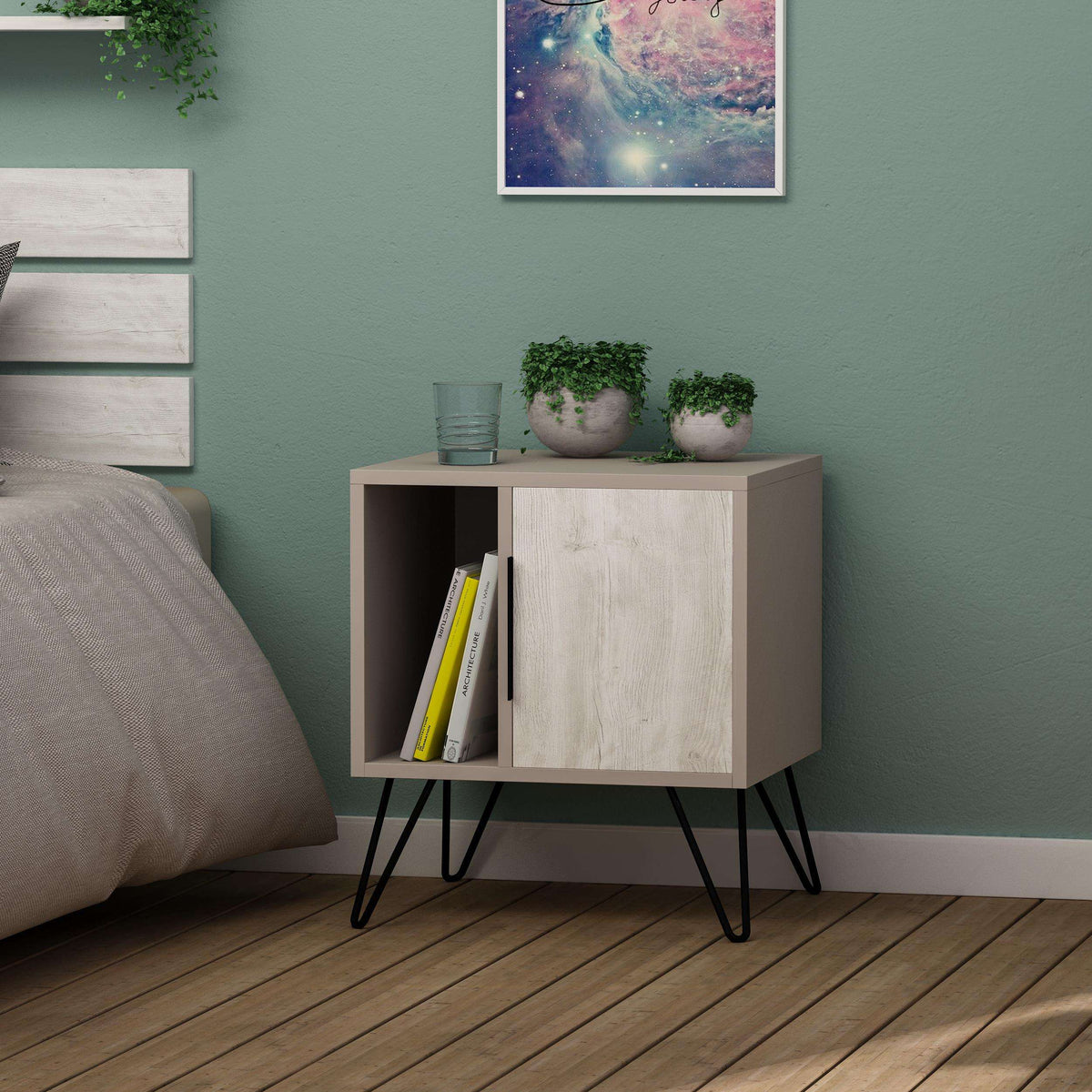 White modern bedside table with two-door cabinet and black angled legs in bedroom.