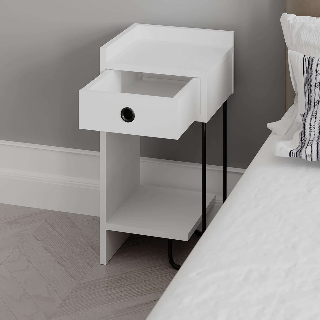 White bedside table module side view with drawer, open shelf, and black legs