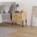 Bedside table with 2 drawers, light oak finish, black tapered legs and bar pulls