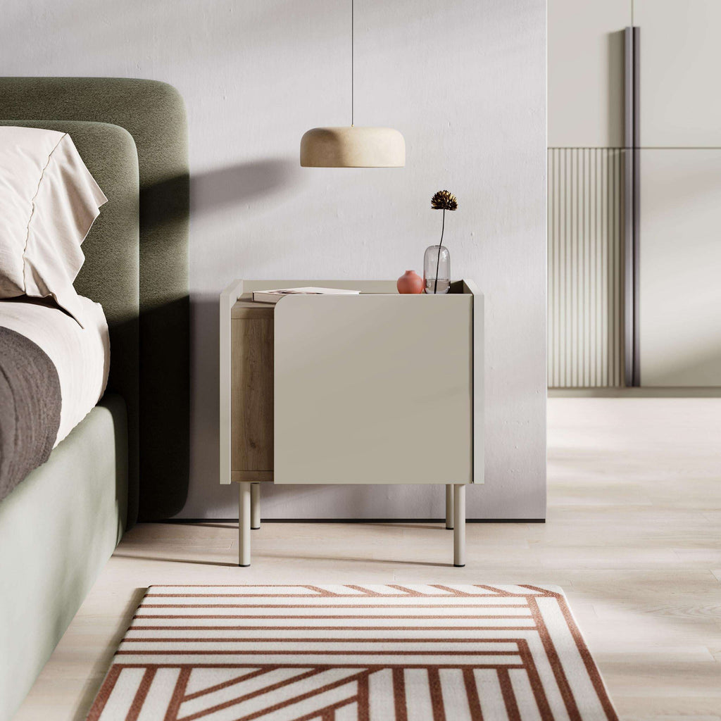Modern bedside table with door open, natural oak finish and light metal legs