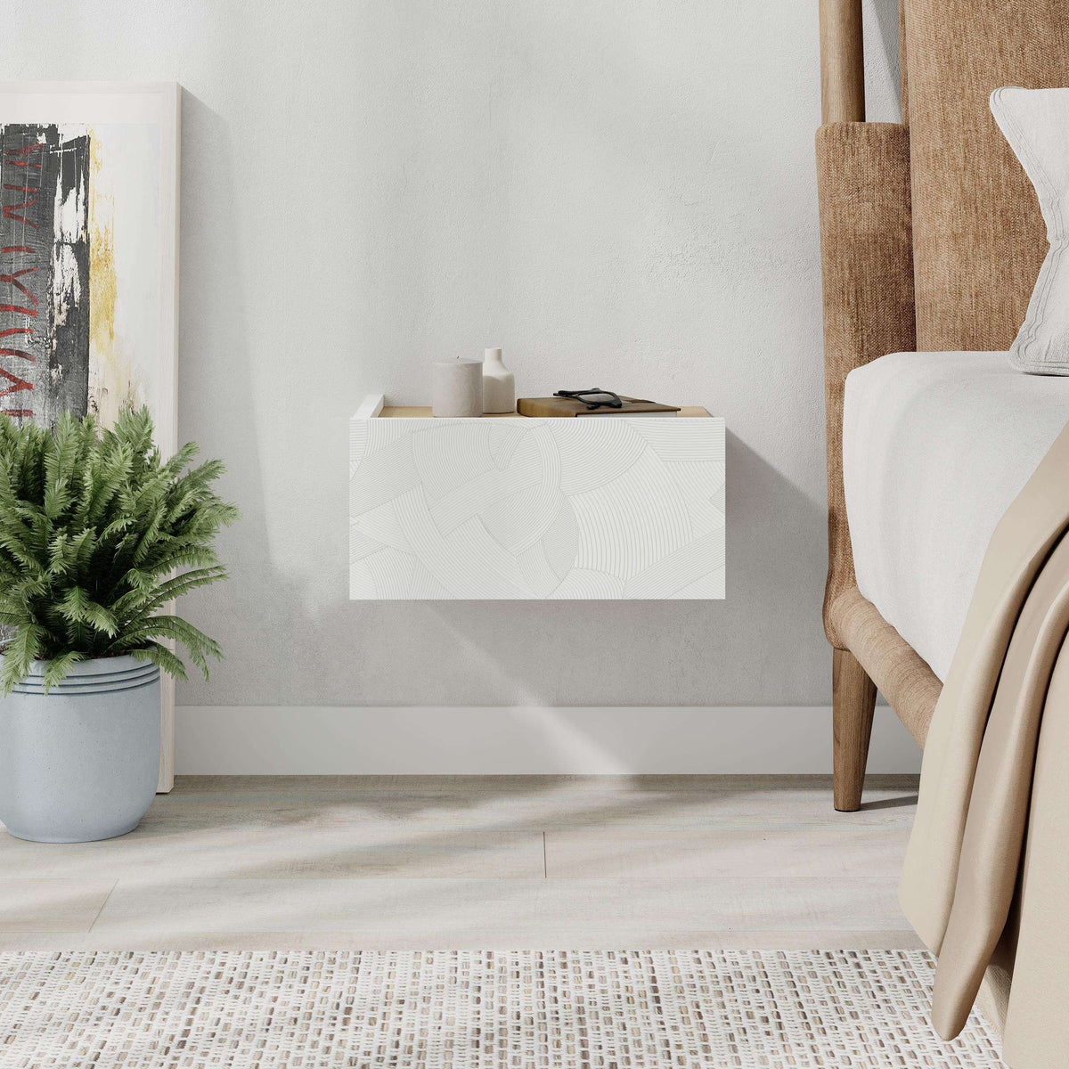 White wall-mounted nightstand drawer with relief pattern, mounted above floor