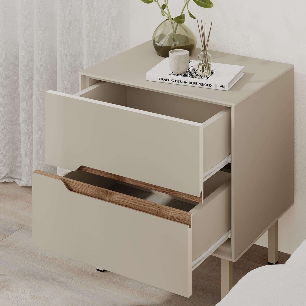 White bedside table with open drawer, warm wood handle and side shelf space