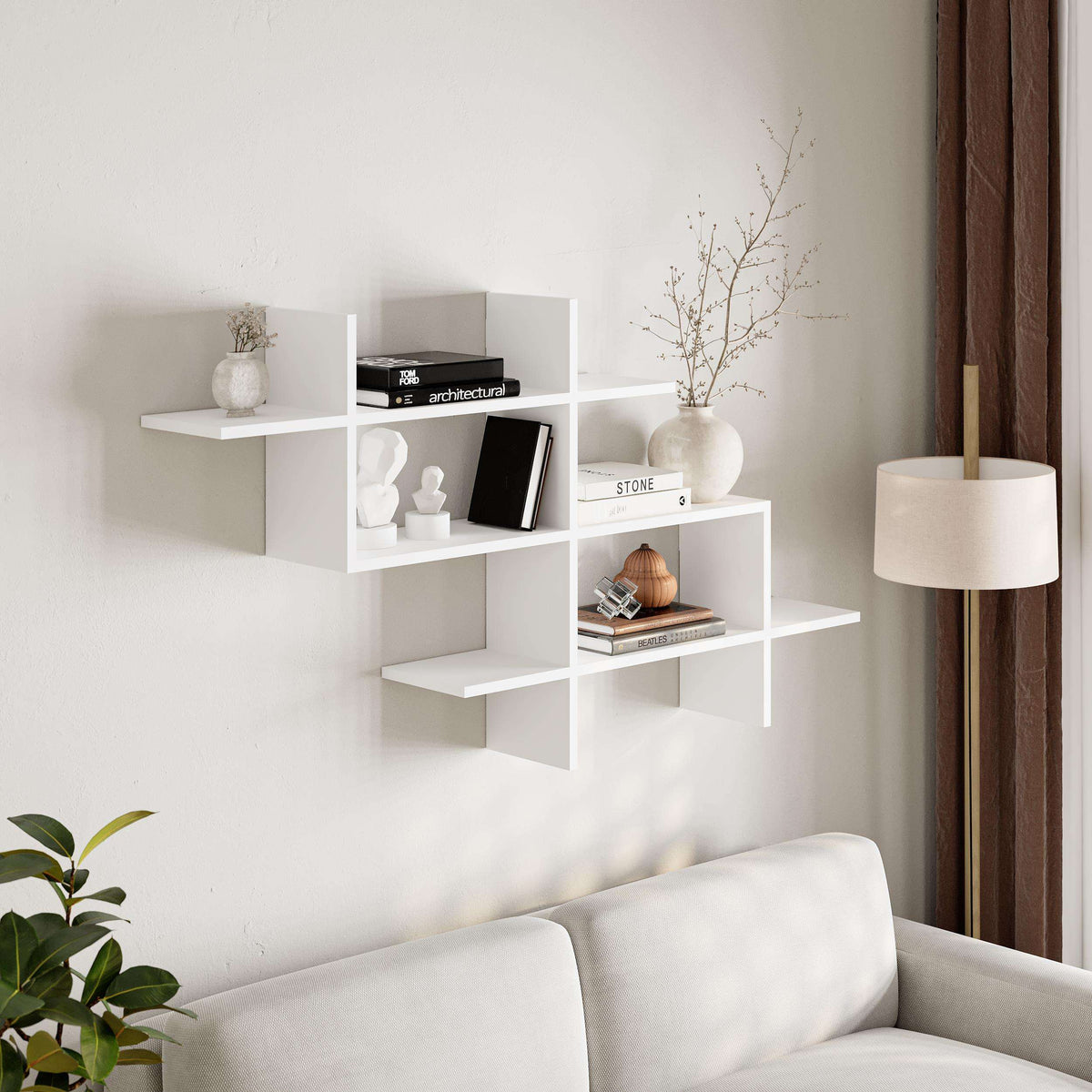 Wall-mounted white modern bookcase with open cube shelving and horizontal ledges