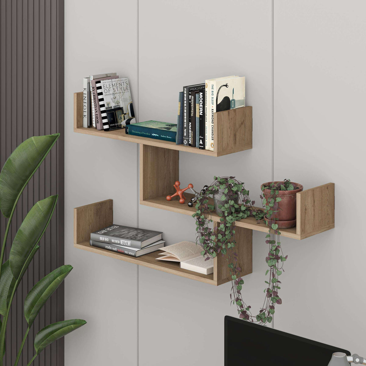 Floating wall bookcase with multiple open shelves in light oak, modern wall-mounted display