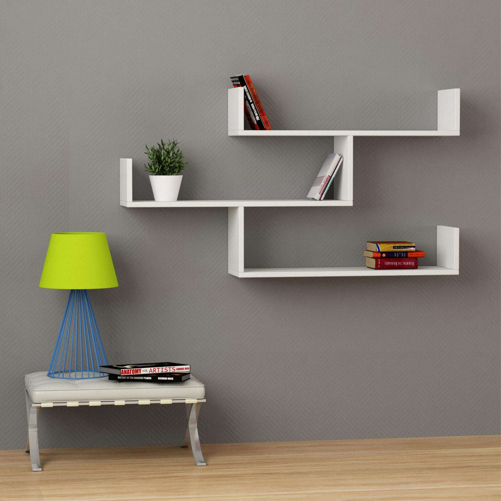 White floating wall bookcase shelf unit with three open compartments and vertical frame
