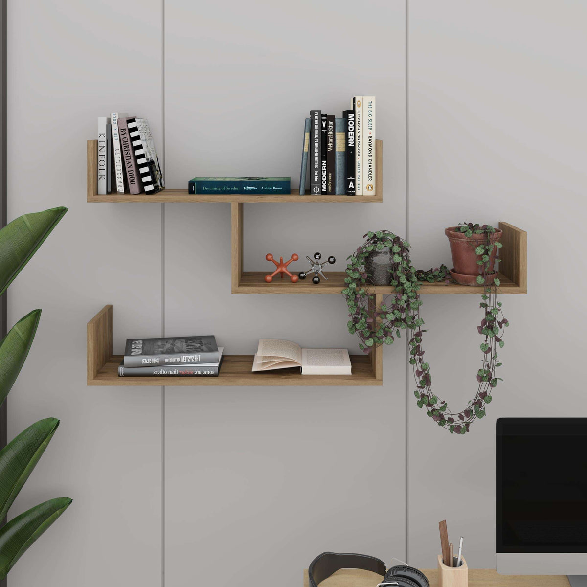 Wall-mounted floating shelf unit with three open compartments in light oak