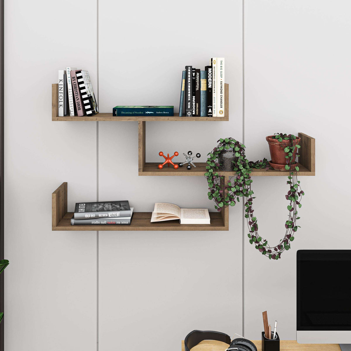 Floating wall bookcase with multiple open cubby shelves in light oak and neutral tones