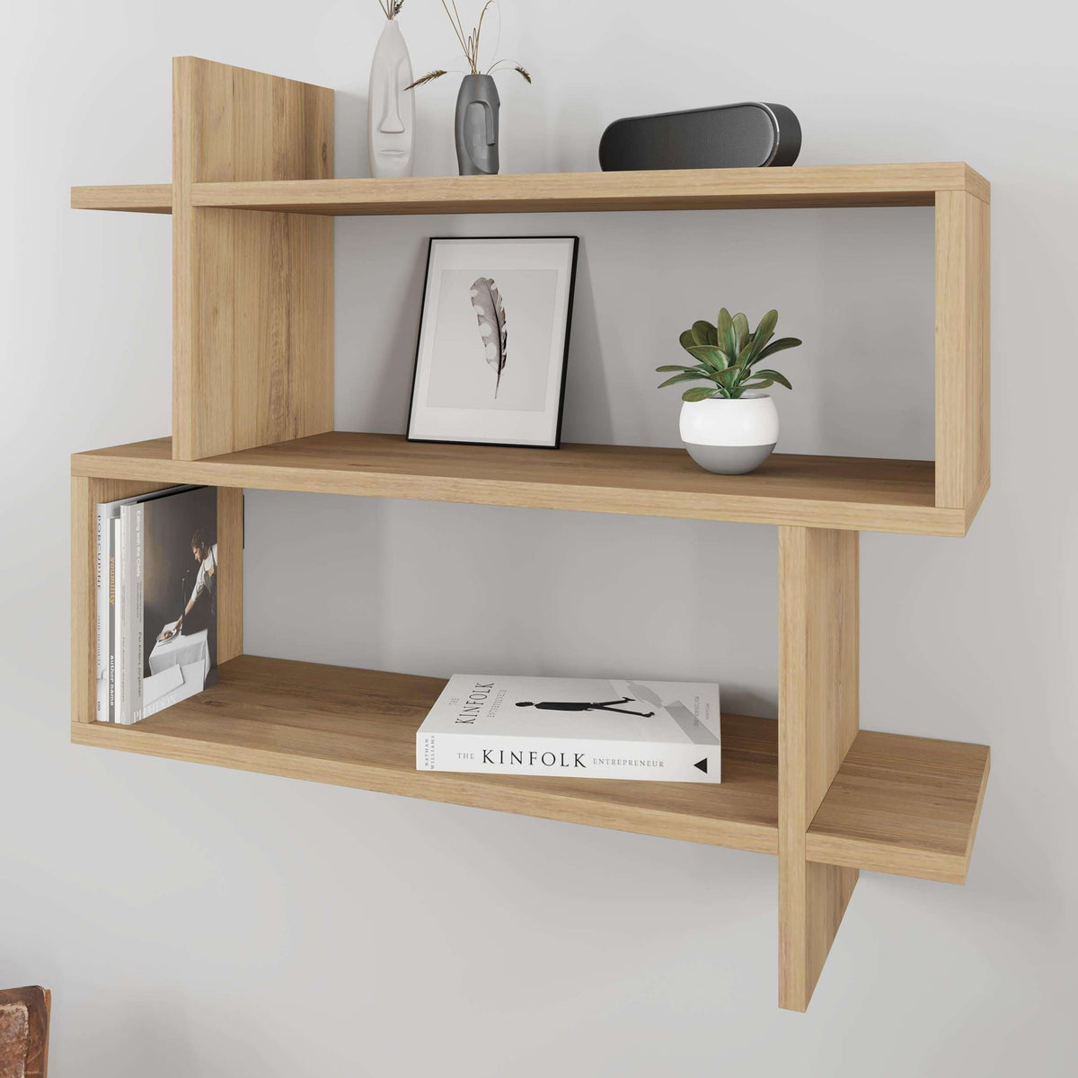 Light oak 2-tier wall mounted bookcase with open shelves and decor items