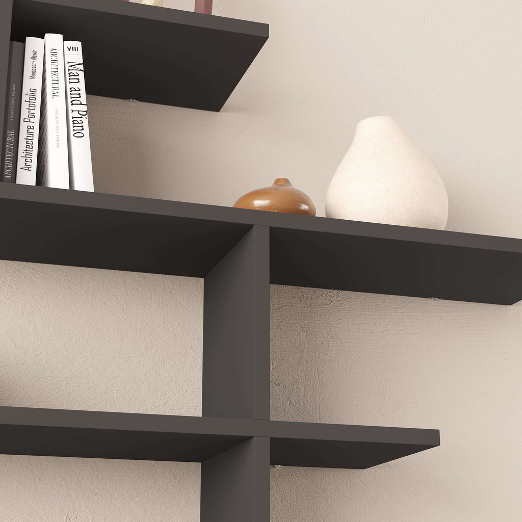 Close-up of anthracite tall wall-mounted floating shelf with three tiers