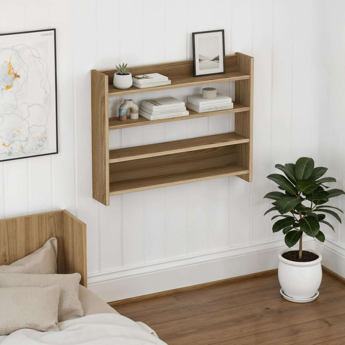 Dark wood 4-tier wall shelf mounted on wall with books, plant, and framed photo
