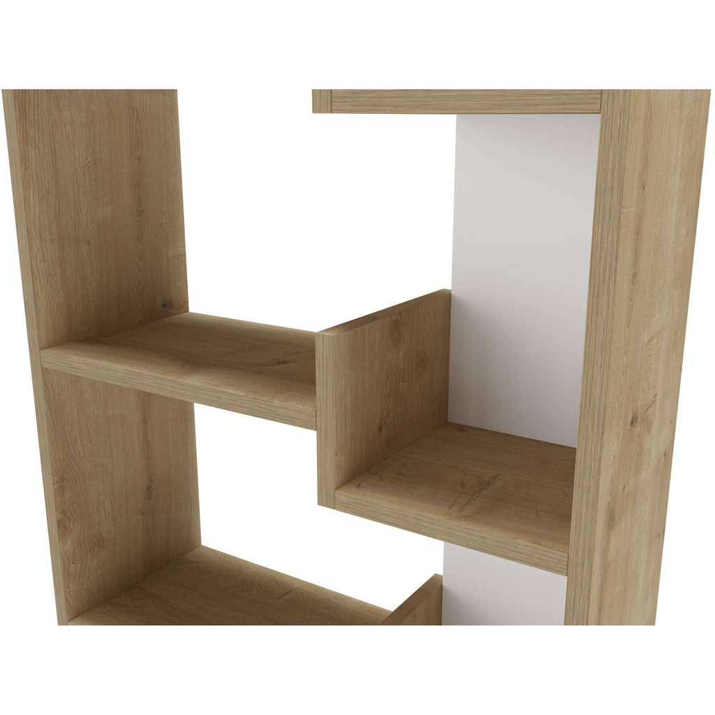 Open shelf section of tall bookcase display unit with stepped interior compartments