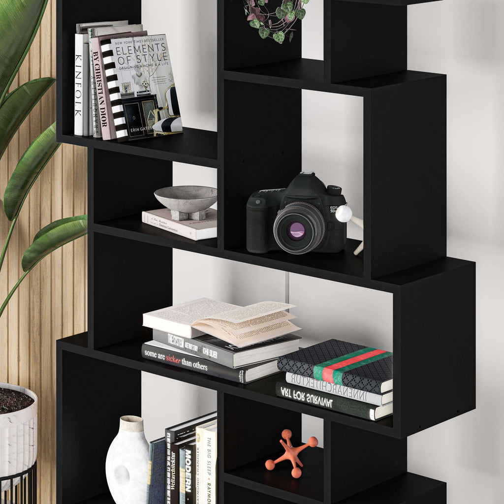 Black tall bookcase display unit with open square cubby shelves and wide ledge levels.