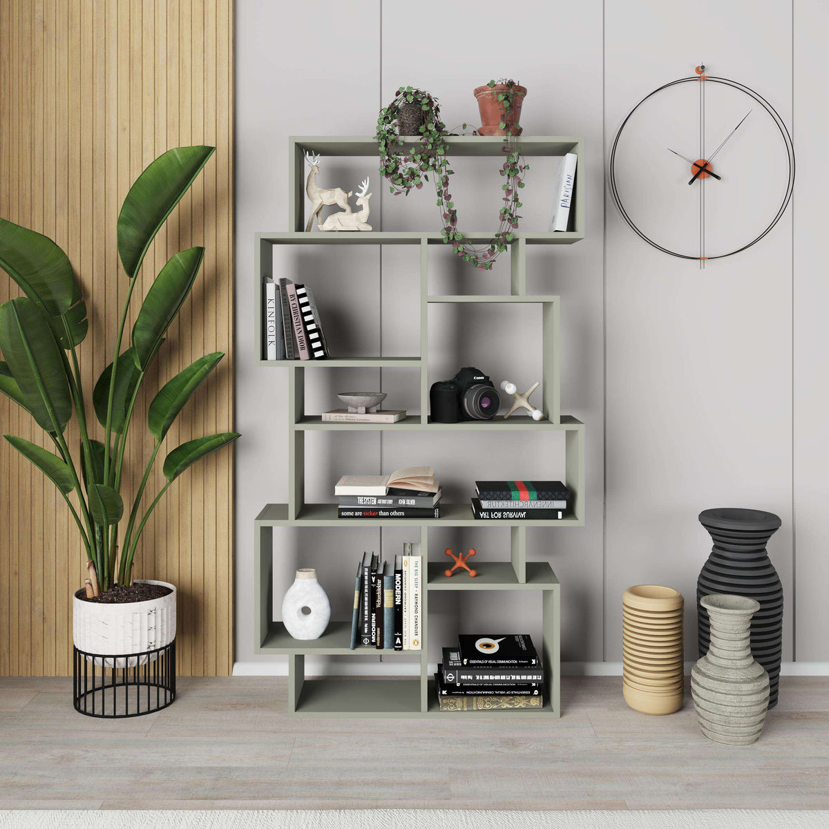 Light grey tall bookcase with open square shelves for books and decorative accessories.