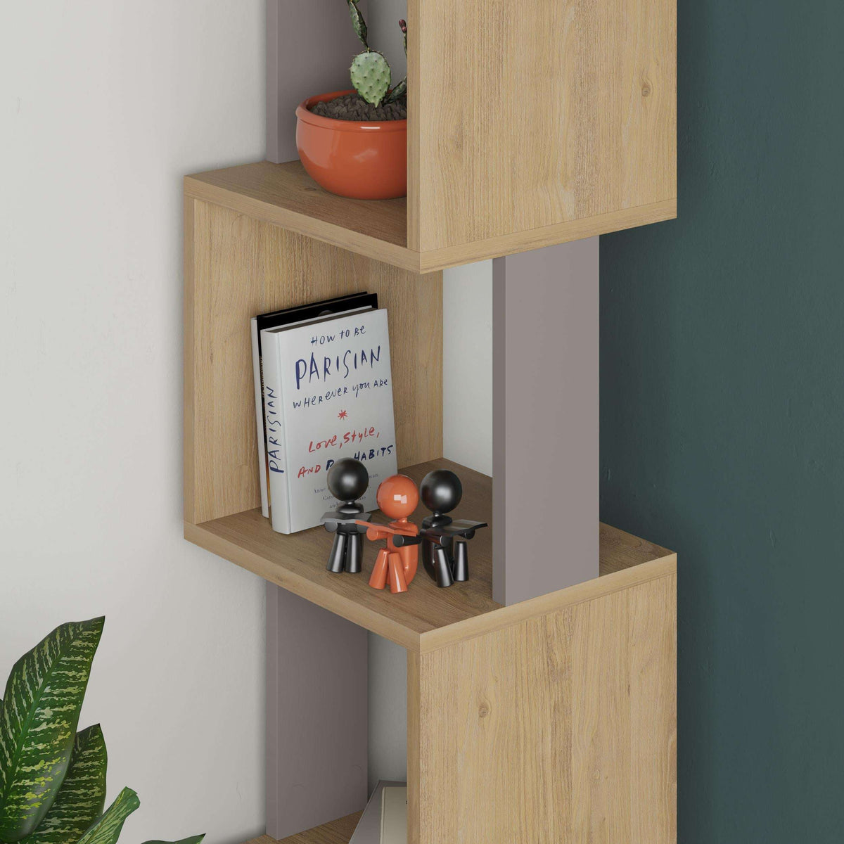 Bookcase corner with open shelves in light wood finish and light gray sides