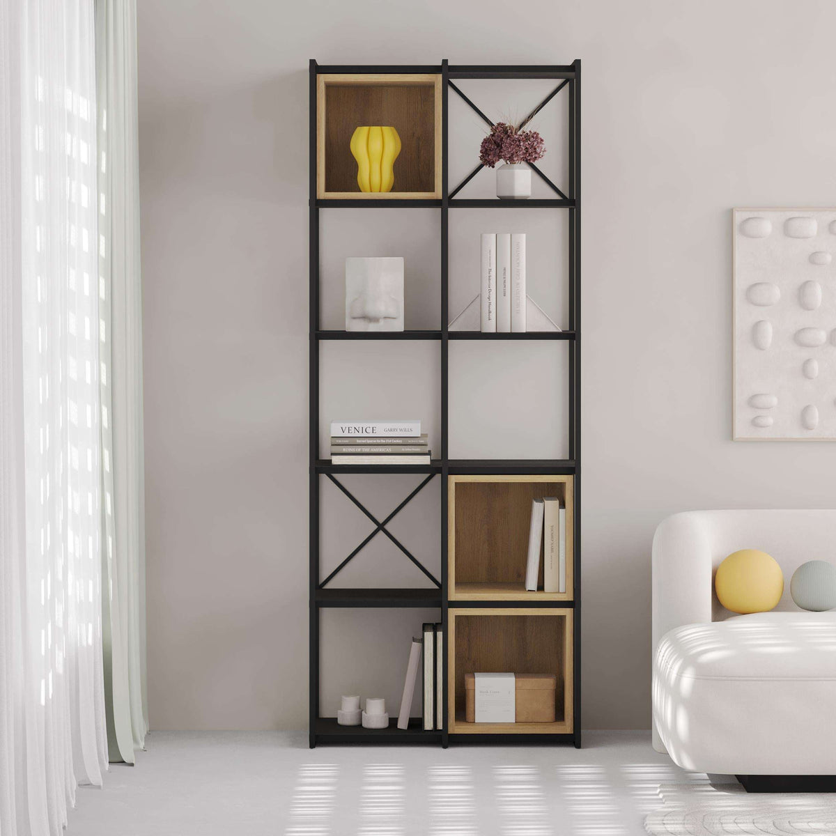 Tall industrial bookcase with black frame, mixed light wood cubbies and open shelving