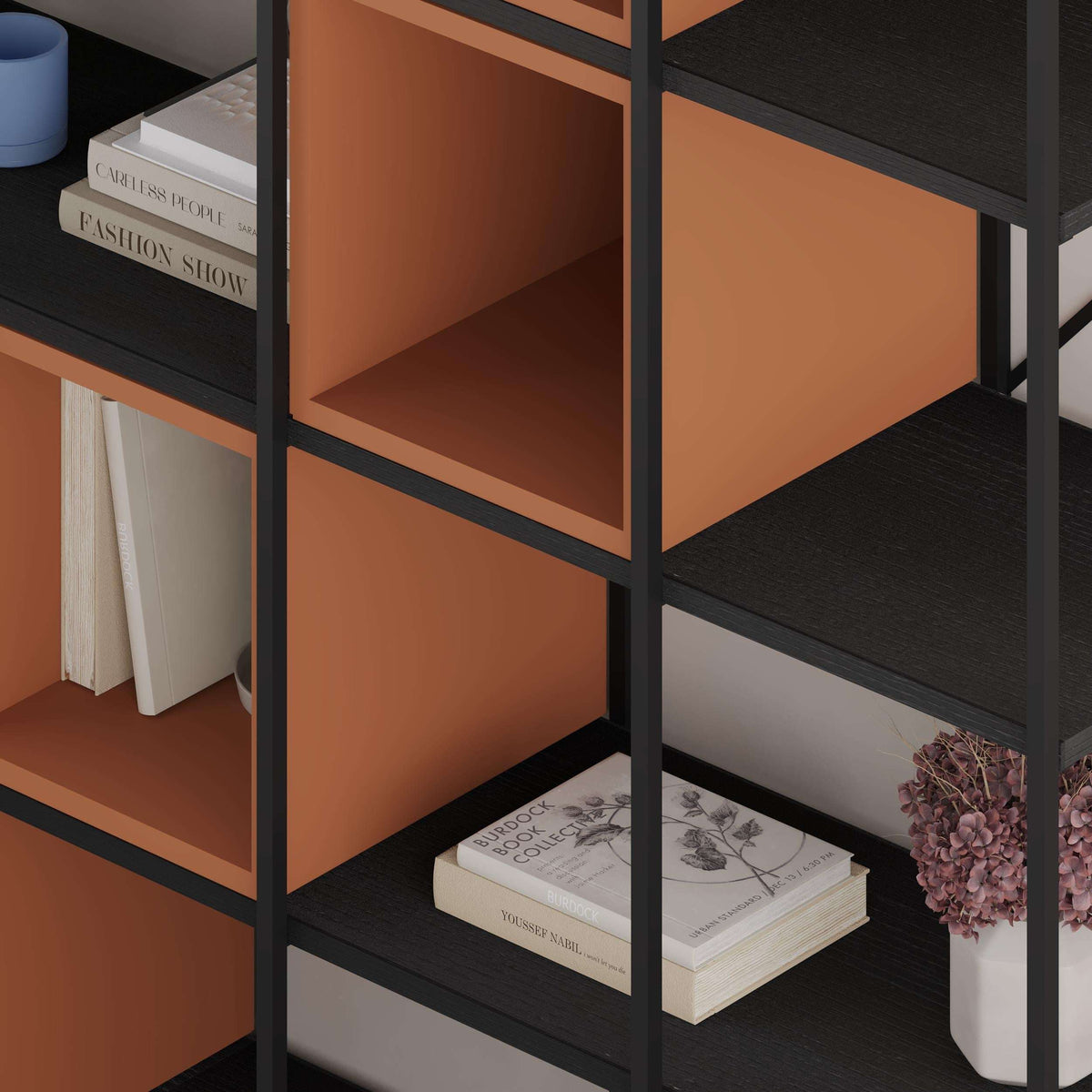 Warm orange panel industrial bookcase set with open cubbies and black metal frame