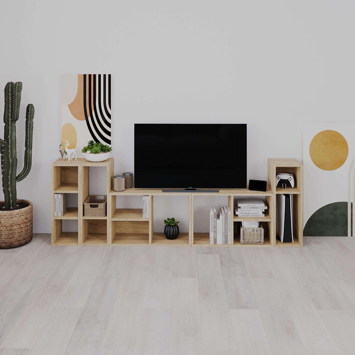 Low standing oak bookcase with open cube shelves and storage compartments