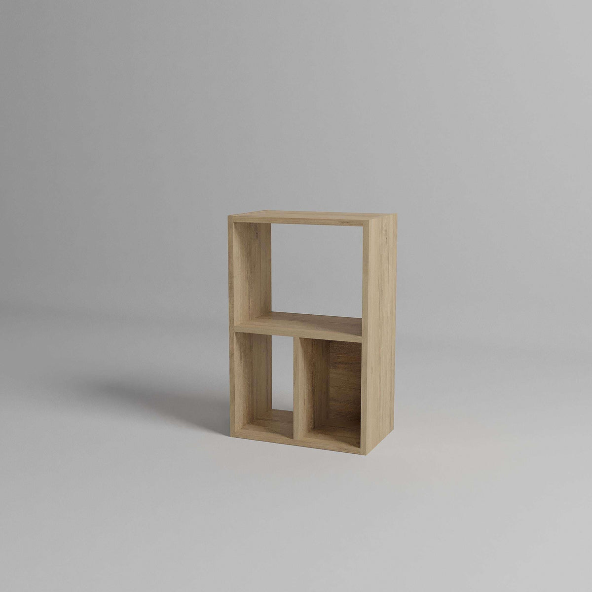Modular low bookcase with light oak finish and open cubby compartments