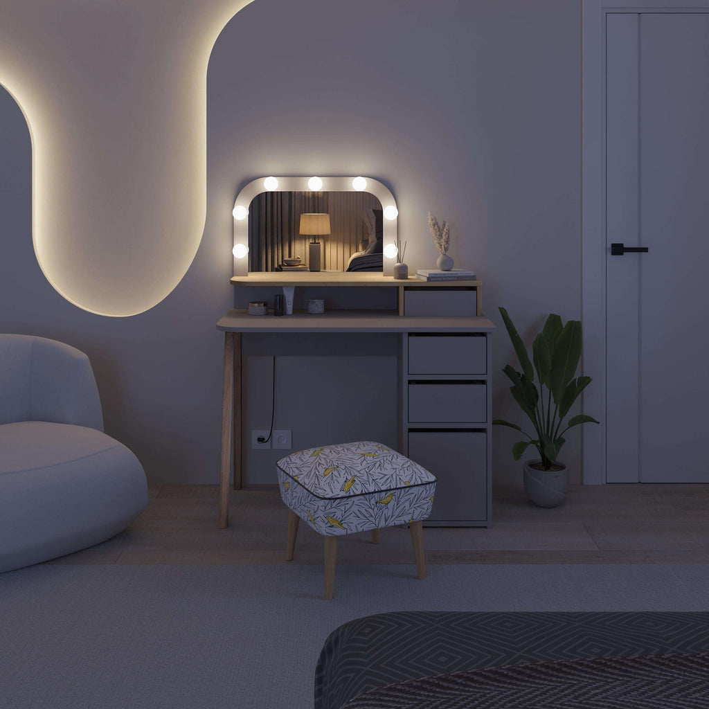 Grey dressing table set with illuminated LED mirror and drawer cabinet in lit room