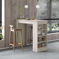 Modern kitchen bar table with white base, dark top, and open storage shelves