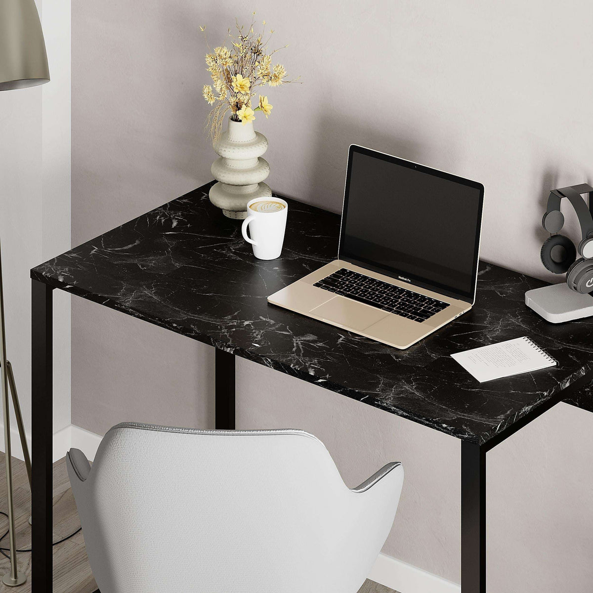Working desk with black marble-look top and black metal frame