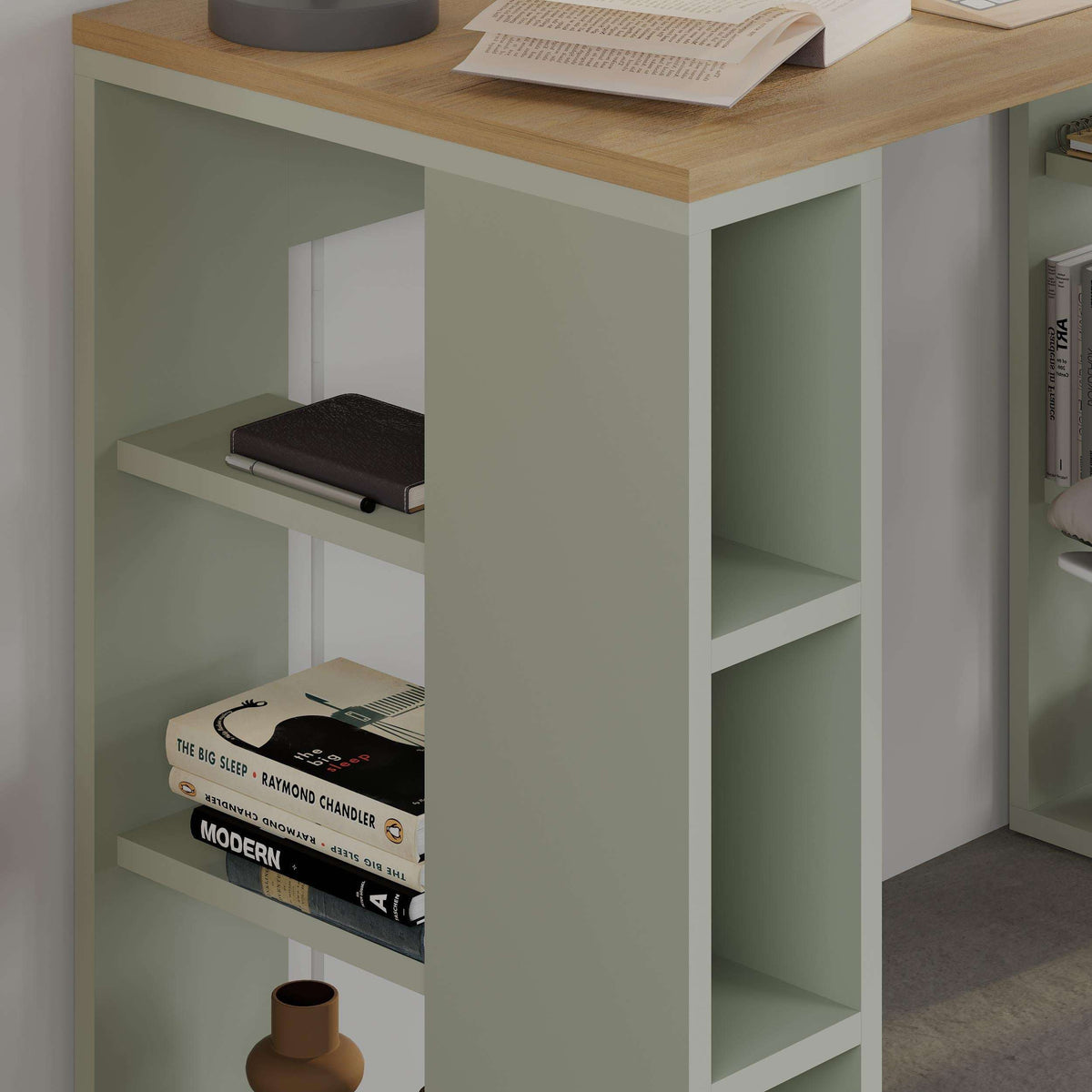 Ash green study desk with open shelves and side cubbies, light wood top