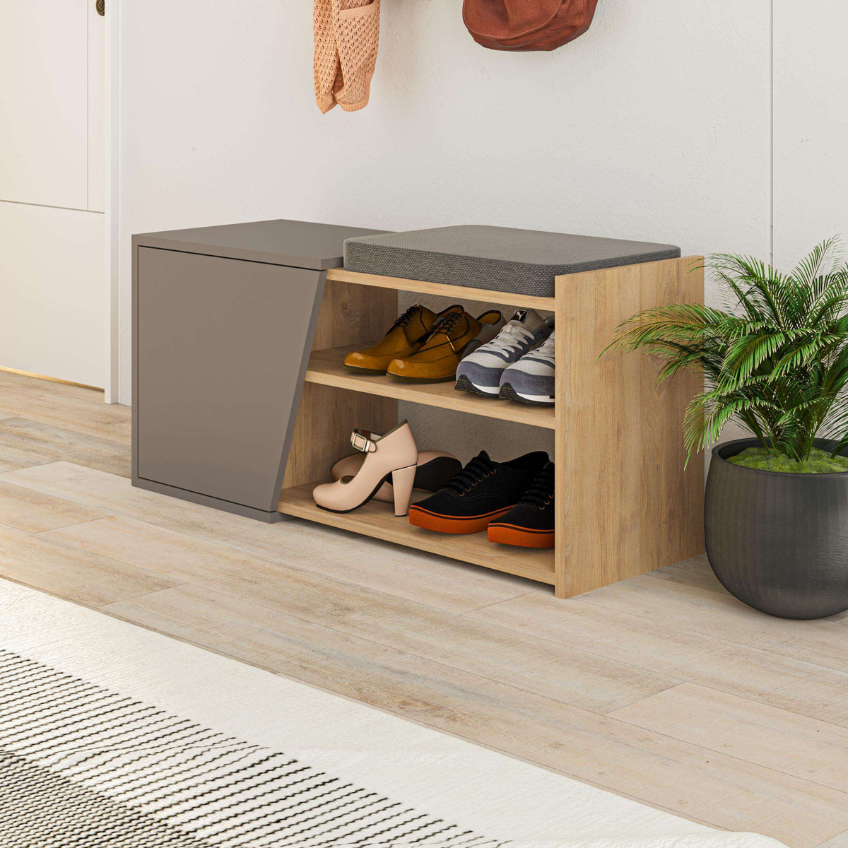 Shoe storage bench with open shoe shelves, dark top cushion, gray interior and light wood frame