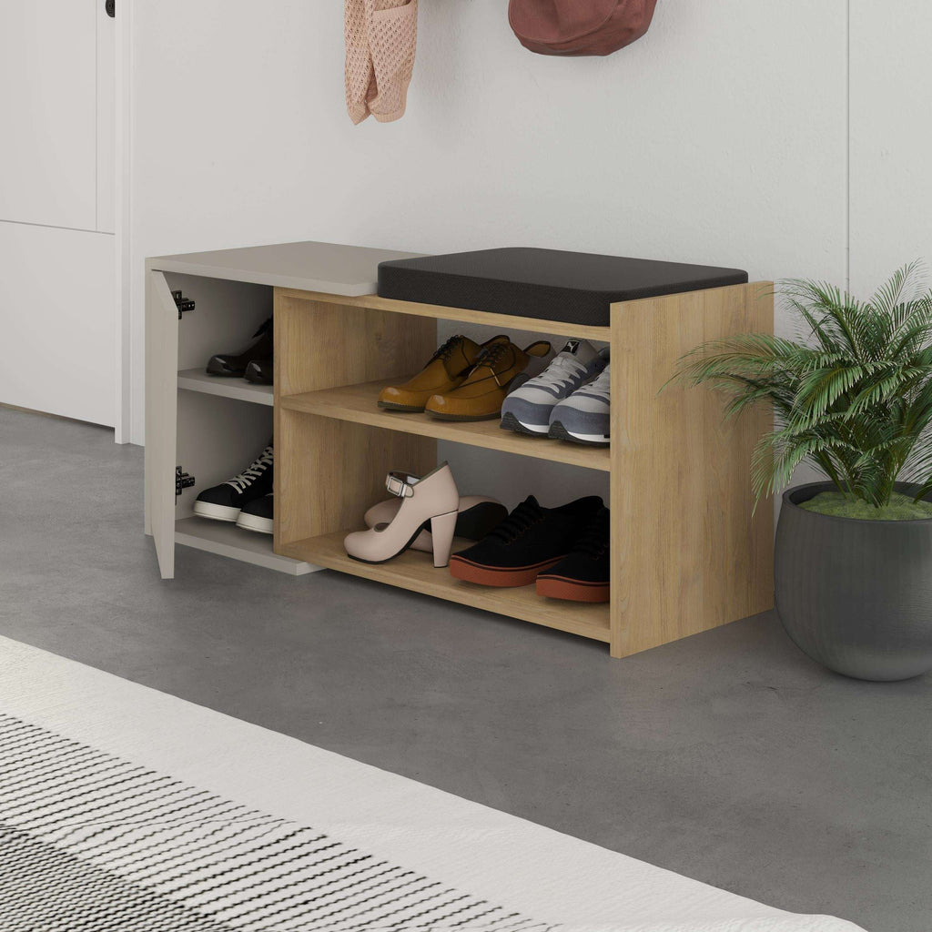 Shoe storage bench with hinged lid, open compartments showing shoes, oak and sandstone finish