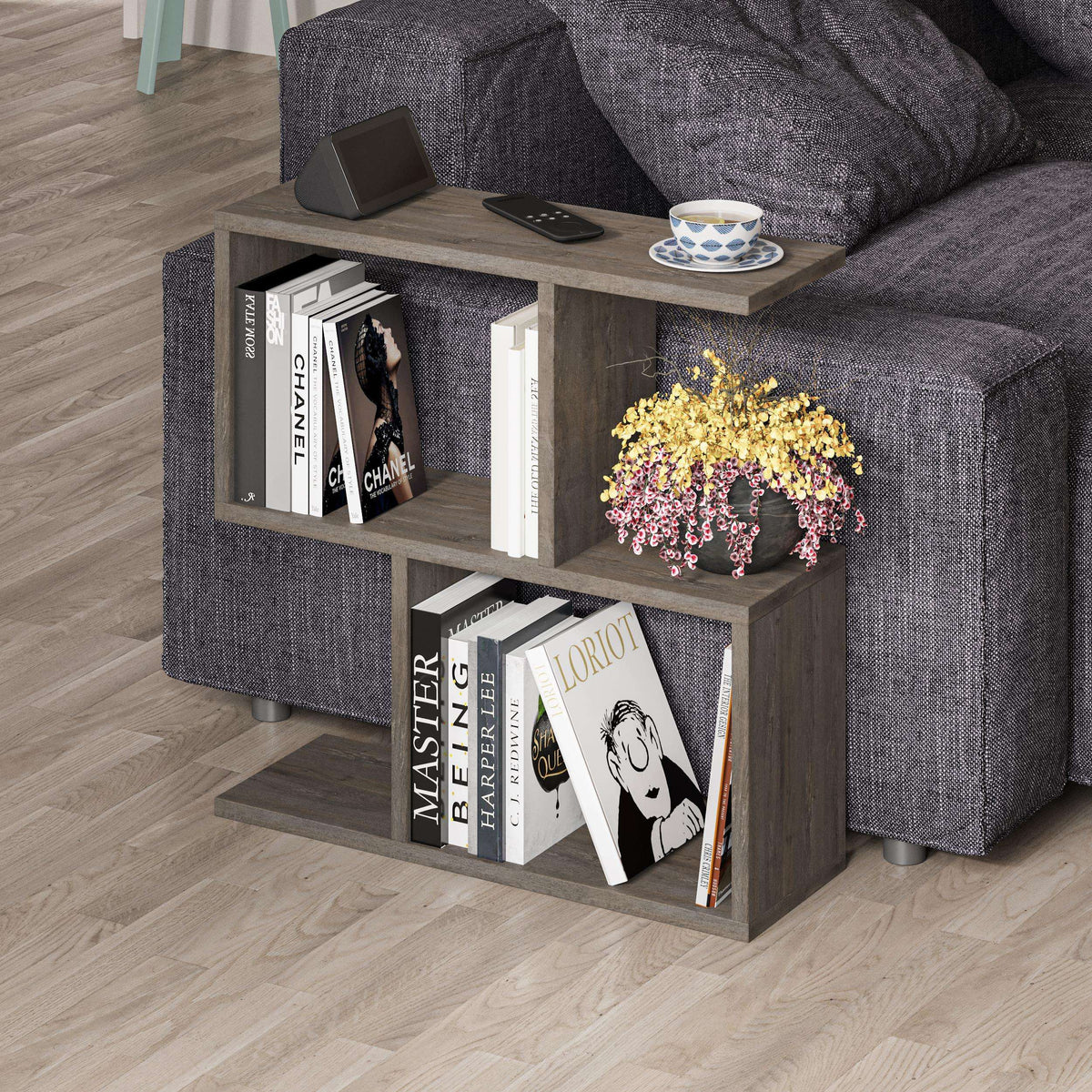 Modern side table with 4 open shelves, dark grey frame with open cubbies and tabletop.