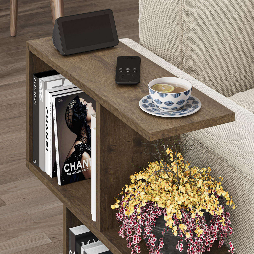 Wood-and-white modern side table with 4 open shelves, books and speaker on top